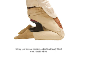 Sitting in kneeling position while using SalatBuddy Contemporary Prayer and Poster Stool with 3 Multi-Risers