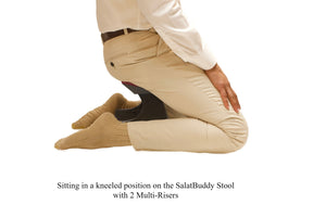 Sitting in kneeling position while using SalatBuddy Contemporary Prayer and Poster Stool with 2 Multi-Risers